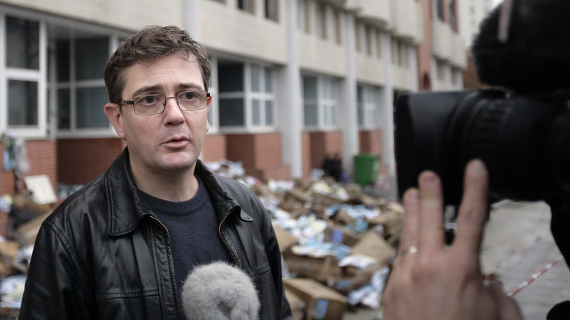 Charlie Hebdo's publisher, known only as Charb, talked to journalists today (Nov. 2, 2011) in front of his publication's burned-out offices. 