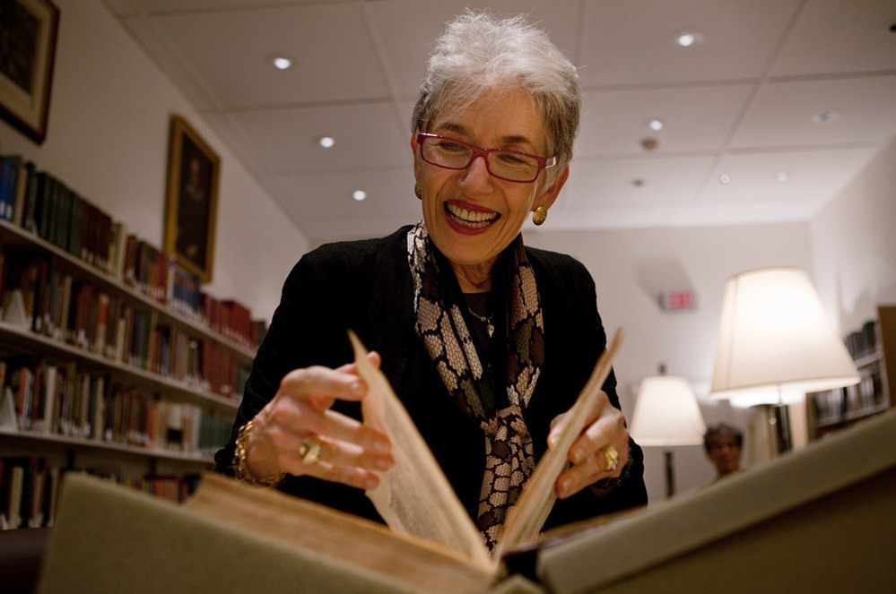 Dava Sobel, who has written a new book about Copernicus, pages through a first edition copy of the astronomer's 1543 work On the Revolutions of the Heavenly Spheres at Dibner Library of the History of Science and Technology at the Smithsonian National Museum of American History in Washington, D.C.