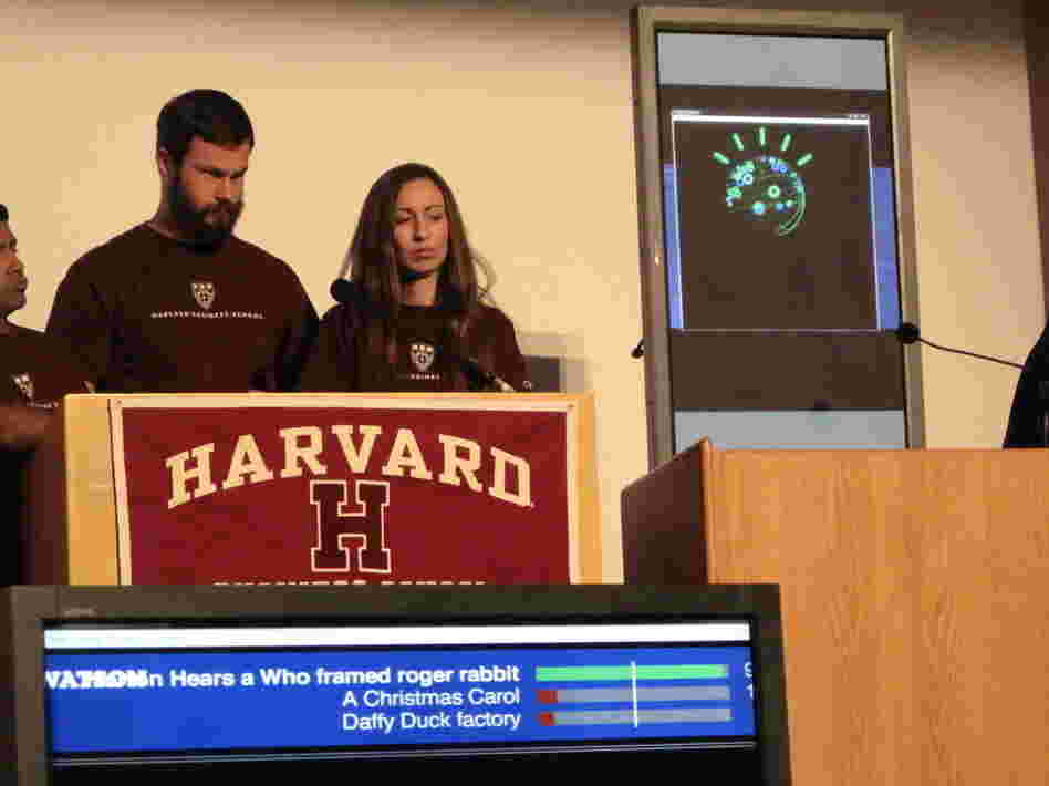 Harvard Business School's Jayanth Iyengar (far left), Jonas Peter Akins and Genevieve Sheenan held their own, but eventually lost to IBM's Watson in a game of Jeopardy at a conference on jobs and technology.