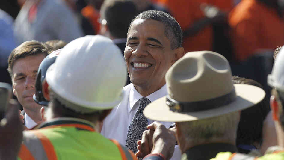 President Obama shakes hands with members of the audience Wednesday after speaking in front of the Key Bridge, in the Georgetown neighborhood of Washington, D.C. He urged Congress to pass the infrastructure piece of the American Jobs Act. President Obama shakes hands with members of the audience Wednesday after speaking in front of the Key Bridge, in the Georgetown neighborhood of Washington, D.C. He urged Congress to pass the infrastructure piece of the American Jobs Act.