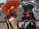 Indian Border Security Force soldiers (in khakhi) and Pakistani Rangers (in black) perform the daily retreat ceremony at the India-Pakistan border in Wagah. It's hoped that freer trade will reduce tensions between their two nations. Indian Border Security Force soldiers (in khakhi) and Pakistani Rangers (in black) perform the daily retreat ceremony at the India-Pakistan border in Wagah. It's hoped that freer trade will reduce tensions between their two nations.