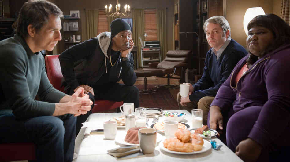 When A Plan Comes Together: Eddie Murphy (second from left) is a small-time hoodlum recruited by a gang of would-be thieves (Ben Stiller, left, Matthew Broderick, and Gabourey Sidibe) who aim to steal back their life savings from a Wall Street swindler.