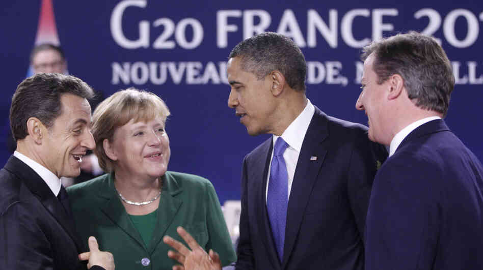 President Obama speaks with (from left) French President Nicolas Sarkozy, German Chancellor Angela Merkel and British Prime Minister David Cameron at the G-20 summit in Cannes, France, on Thursday. The talks were dominated by Greece's financial woes. President Obama speaks with (from left) French President Nicolas Sarkozy, German Chancellor Angela Merkel and British Prime Minister David Cameron at the G-20 summit in Cannes, France, on Thursday. The talks were dominated by Greece's financial woes.