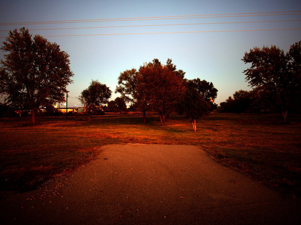 Karen Howe's driveway is all that remains of her former home. Continental Carbon bought her home and many others, and tore them down after a settlement was reached.