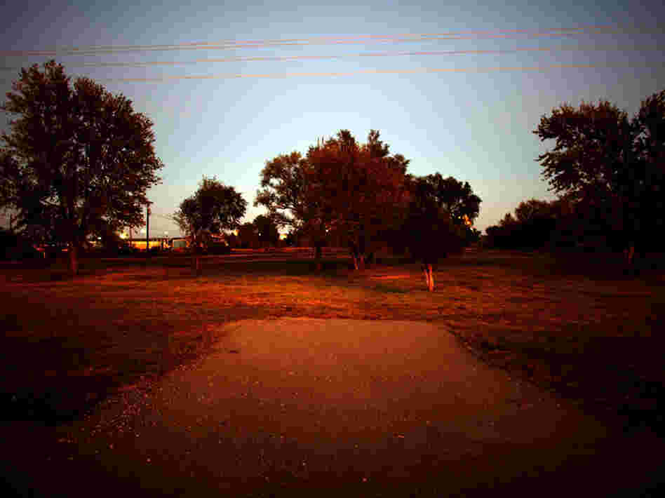 Karen Howe's driveway is all that remains of her former home. Continental Carbon bought her home and many others, and tore them down after a settlement was reached.