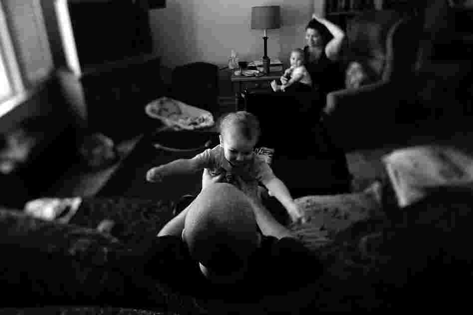 Romo spends time with his family at home.