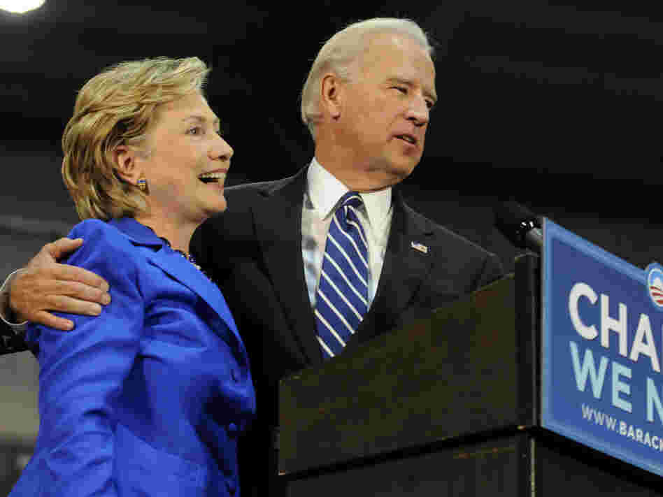 Democratic vice presidential candidate U.S. Senator Joe Biden (D-DE) (R) and U.S. Sen. Hillary Clinton (D-NY) (L) speak at a rally in support of then Democratic presidential nomineee U.S. Sen. Barack Obama (D-IL) on Oct. 11, 2008 in Scranton, Pennsylvania. 