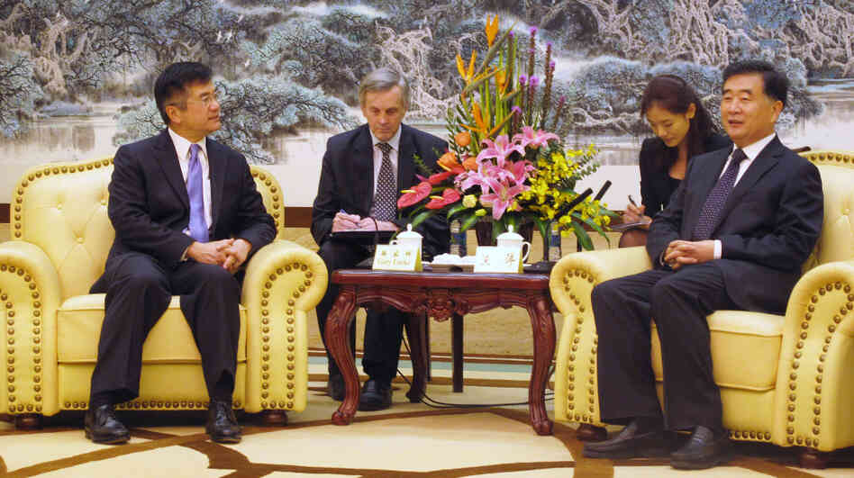 U.S. Ambassador to Beijing Gary Locke (far left) meets Communist Party Secretary for Guangdong province Wang Yang (far right) on Nov. 4. Locke, the first Chinese-American ambassador from the U.S. to Beijing, is earning fans in China with his humble ways — in stark contrast, in some instances, to Chinese officials.