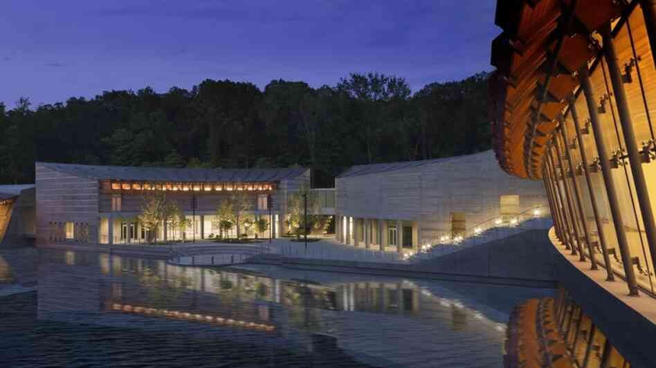 Of Art And Nature: A model shows one of the three ponds that will surround Crystal Bridges. The museum got its name from the two galleries that will actually serve as bridges over the ponds. Architect Moshe Safdie says his design is meant to help blend the experience of the museum's art with that of its natural surroundings. Of Art And Nature: A model shows one of the three ponds that will surround Crystal Bridges. The museum got its name from the two galleries that will actually serve as bridges over the ponds. Architect Moshe Safdie says his design is meant to help blend the experience of the museum's art with that of its natural surroundings.