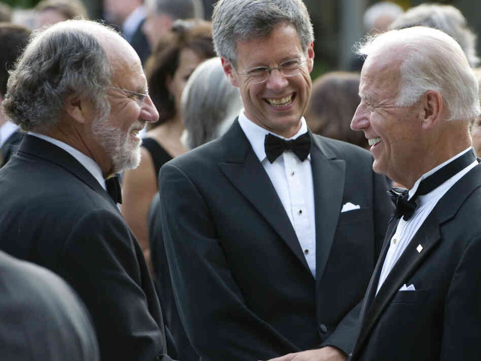 Former U.S. Senate colleagues, Vice President Biden and Jon Corzine (left) greet each other at a White House reception, June 7, 2011. 