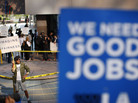In Los Angeles: A man dressed as John Lennon at the "Move Your Money" protest on Saturday. He and others protested bank fees and pushed for "good jobs." In Los Angeles: A man dressed as John Lennon at the "Move Your Money" protest on Saturday. He and others protested bank fees and pushed for "good jobs."