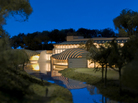 A model shows a view of the Crystal Bridges pavilion some museum staff refer to as "the armadillo" because of how its curved, copper bands resemble the animal's shell. A model shows a view of the Crystal Bridges pavilion some museum staff refer to as "the armadillo" because of how its curved, copper bands resemble the animal's shell.