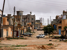 This abandoned village outside the city of Zintan was populated by pro-Gadhafi families from the Mushashya, a nomadic tribe from southern Libya. Fighters from Zintan, which rebelled against Gadhafi forces, are hoping they won't come back. This abandoned village outside the city of Zintan was populated by pro-Gadhafi families from the Mushashya, a nomadic tribe from southern Libya. Fighters from Zintan, which rebelled against Gadhafi forces, are hoping they won't come back.