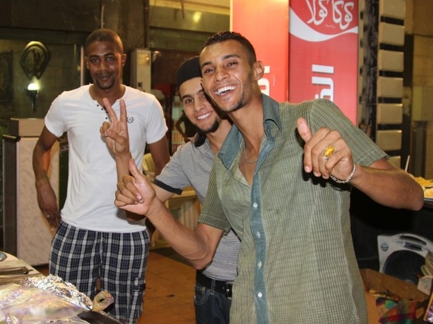 Young men in Tripoli. Many say they like the idea of laws being based on traditional Sharia concepts.