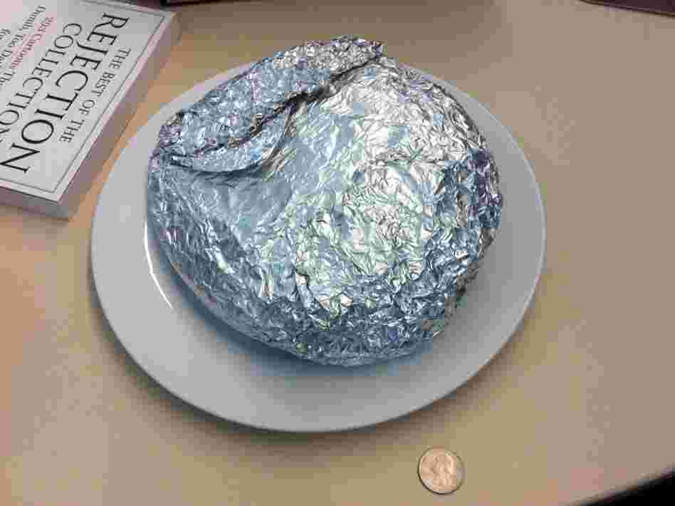 In case you needed to know how small a quarter is, here's one side-by-side with the Shooter's Sandwich. 