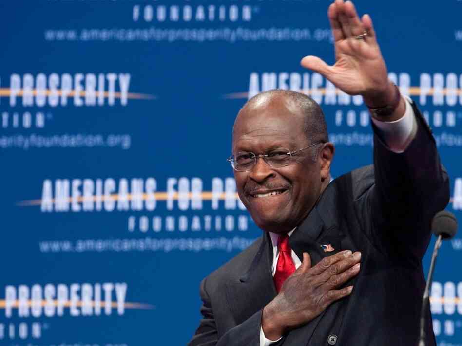 US Republican presidential hopeful Herman Cain arrives to address the 'Defending The American Dream Summit' organized by the conservative Americans For Prosperity (AFP) foundation in Washington on Nov. 4, 2011. US Republican presidential hopeful Herman Cain arrives to address the 'Defending The American Dream Summit' organized by the conservative Americans For Prosperity (AFP) foundation in Washington on Nov. 4, 2011.