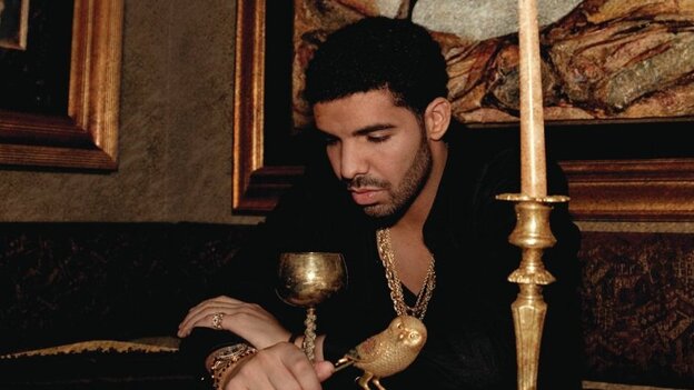Drake, brooding, on the cover of Take Care.