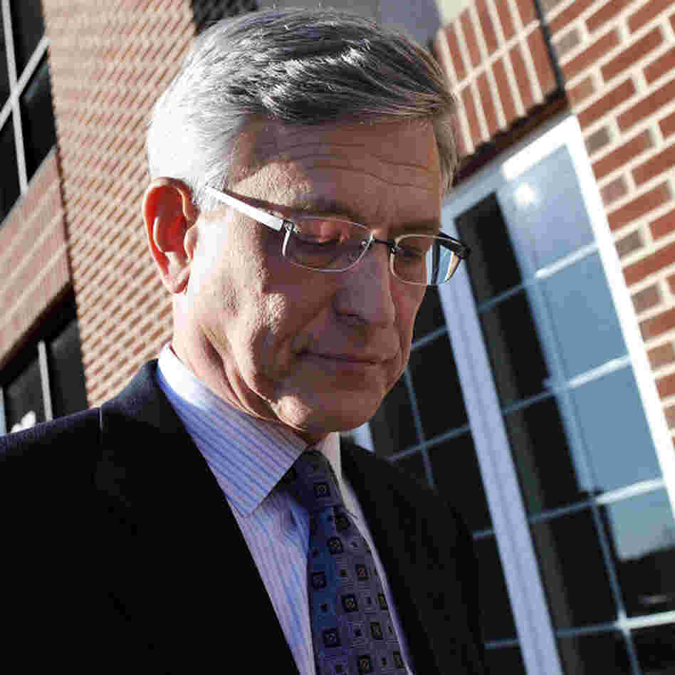 Penn State athletic director Tim Curley walks out of the Magisterial District Court after being arraigned on charges of perjury and failure to report under Pennsylvania's child protective services law on Nov. 7, 2011 in Harrisburg, Pa.