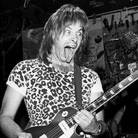 The fictional band from This Is Spinal Tap plays a real-life concert in 1984. Nigel Tufnel, the guitarist played by Christopher Guest, favored amplifiers whose volume could be cranked up to 11. The fictional band from This Is Spinal Tap plays a real-life concert in 1984. Nigel Tufnel, the guitarist played by Christopher Guest, favored amplifiers whose volume could be cranked up to 11.