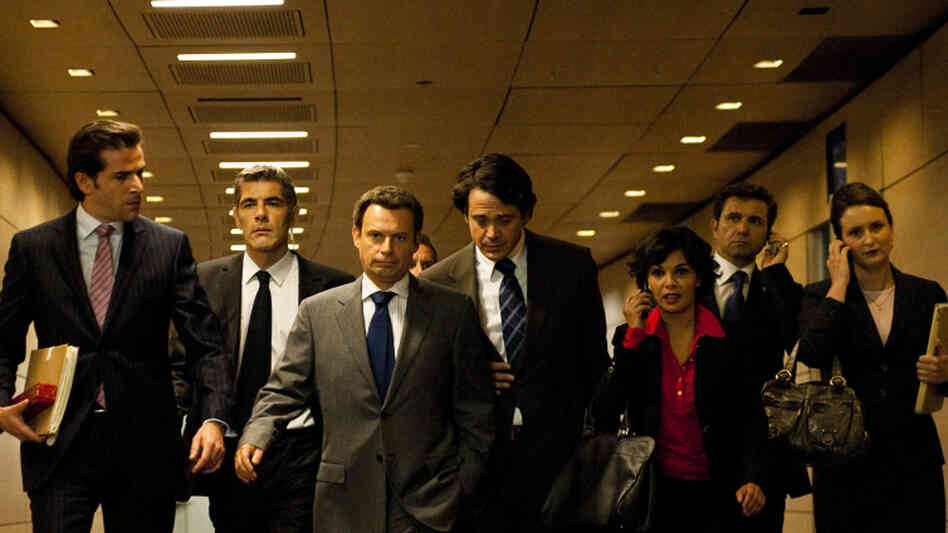 Ruthless Peuple: Denis Podalydès (third from left) portrays a scheming Nicolas Sarkozy in The Conquest, a drama about the French president's rise to power. Ruthless Peuple: Denis Podalydès (third from left) portrays a scheming Nicolas Sarkozy in The Conquest, a drama about the French president's rise to power.