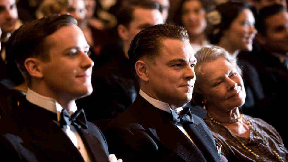 Domestic Asset: Armie Hammer's Clyde Tolson (left, with DiCaprio and Judi Dench as Hoover's mother, Annie) is an unexpectedly sympathetic presence in an otherwise unconvincing film.