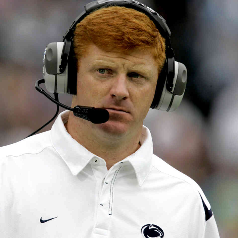 Assistant coach Mike McQueary of the Penn State Nittany Lions walks the sidelines during a game at Beaver Stadium in State College, Pa., Sept. 12, 2009.