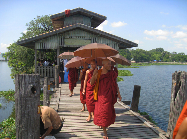 In largely Buddhist Myanmar, monks occupy a revered position in society and have often led anti-government protests. Here, monks walk along the U Bein Bridge in Amarapura, a former capital located just outside Mandalay.