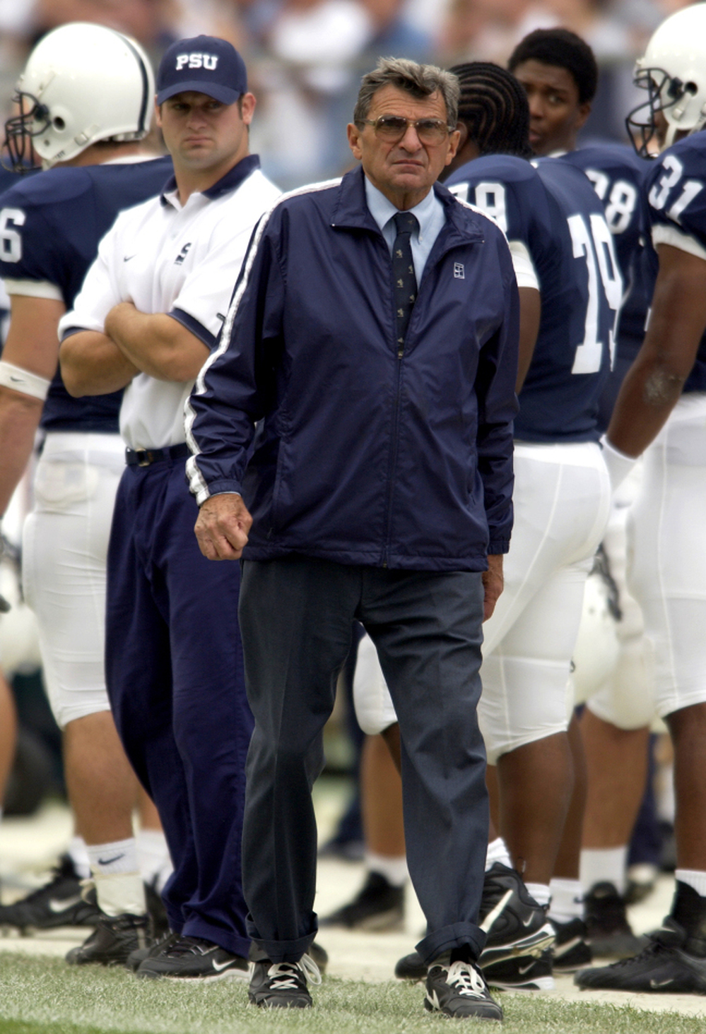 Penn State football coach Joe Paterno was fired Wednesday by the university board. The coach is seen here during the 2002 season, several months after a graduate assistant informed him of seeing alleged sexual abuse in a locker room shower.