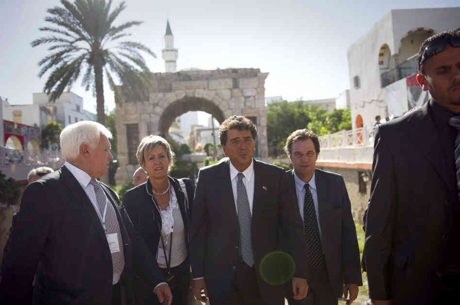 French State Minister for Foreign Trade Pierre Lellouche (center) led a delegation of French business leaders to Tripoli in October. European and Turkish companies have been active in pursuing contracts with the new Libyan government. French State Minister for Foreign Trade Pierre Lellouche (center) led a delegation of French business leaders to Tripoli in October. European and Turkish companies have been active in pursuing contracts with the new Libyan government.
