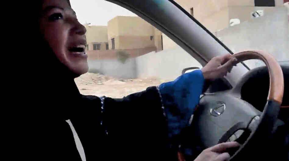 A Saudi woman drives a car in Riyadh in June as part of a campaign to defy the kingdom's ban on women driving. The image is from a video released by Change.org.