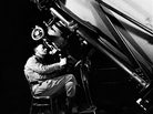 American astronomer Edwin Hubble looks through the eyepiece of the 100-inch telescope at the Mount Wilson Observatory in Los Angeles, 1937. In 1929, Hubble proposed that the more distant a galaxy is, the faster it appears to be receding from us, a concept that has become known as Hubble's law. American astronomer Edwin Hubble looks through the eyepiece of the 100-inch telescope at the Mount Wilson Observatory in Los Angeles, 1937. In 1929, Hubble proposed that the more distant a galaxy is, the faster it appears to be receding from us, a concept that has become known as Hubble's law.