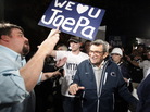 Scott Paterno, left, greeted his father — Penn State football coach Joe Paterno — as the coach arrived at his home, Tuesday evening in State College, Pa. Hundreds of students had gathered to show support for the coach. Scott Paterno, left, greeted his father — Penn State football coach Joe Paterno — as the coach arrived at his home, Tuesday evening in State College, Pa. Hundreds of students had gathered to show support for the coach.