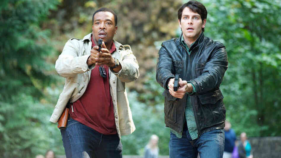 Russell Hornsby as Hank Griffin and David Giuntoli as Nick Burkhardt on NBC's Grimm.