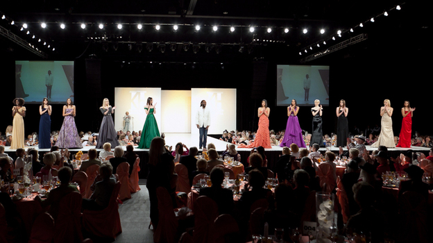 Kevan Hall stands with his models at the Frank Sinatra Fashion Show in February. The designer has dressed A-listers and won multiple awards. 