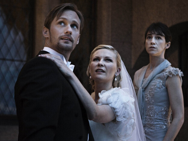 A bride (Kirsten Dunst, with Alexander Skarsgard and Charlotte Gainsbourg) battles depression — and the possible end of the world — in Melancholia.