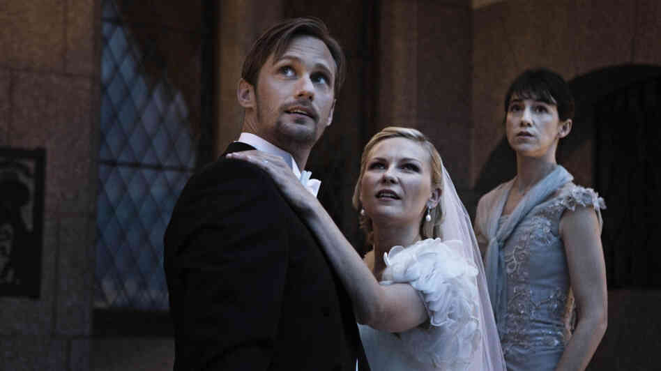A bride (Kirsten Dunst, with Alexander Skarsgard and Charlotte Gainsbourg) battles depression — and the possible end of the world — in Melancholia.