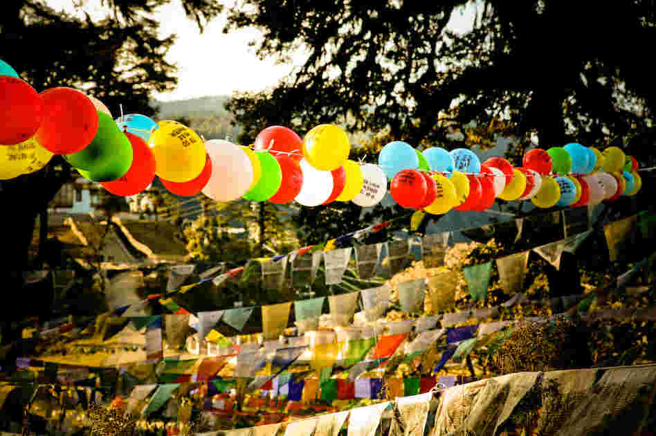 On the final night of the project, Harris strung 117 balloons with thousands of prayer flags in a sacred mountain pass. On the final night of the project, Harris strung 117 balloons with thousands of prayer flags in a sacred mountain pass.