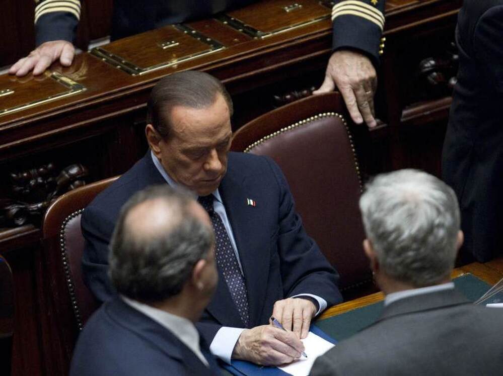 Italian Premier Silvio Berlusconi promised Tuesday to resign after parliament passed economic reforms demanded by the European Union. The debt crisis in Europe has been compounded by political problems.