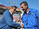 With Penn State coach Joe Paterno ousted, rumors are speculating that former Florida coach Urban Meyer will be his replacement. In January, the two shook hands before the Outback Bowl. With Penn State coach Joe Paterno ousted, rumors are speculating that former Florida coach Urban Meyer will be his replacement. In January, the two shook hands before the Outback Bowl.