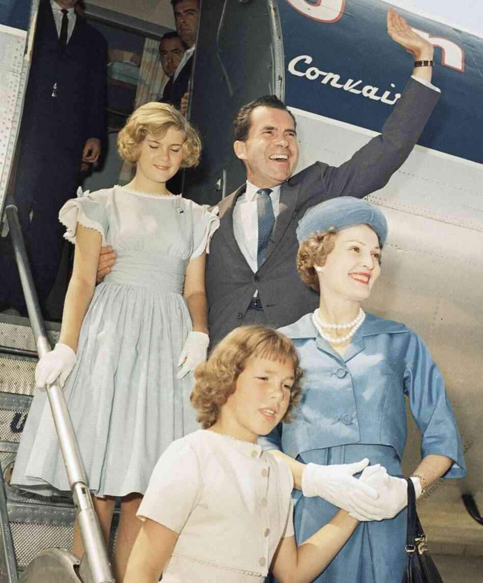 Then-Vice President Richard Nixon arrives in Chicago for the 1960 Republican National Convention with his wife, Pat, and his daughters Patricia (left) and Julie (right). Mrs. Nixon was known for her ever-present smile and well-groomed appearance. 