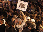 Scores of students gathered late Wednesday near the Penn State campus in State College, Pa., to protest the firing of football coach Joe Paterno. Dozens of police officers wearing helmets and carrying pepper spray were called in to control the crowd. Scores of students gathered late Wednesday near the Penn State campus in State College, Pa., to protest the firing of football coach Joe Paterno. Dozens of police officers wearing helmets and carrying pepper spray were called in to control the crowd.