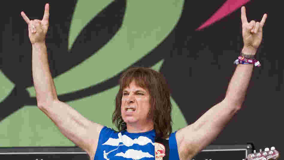 The Devil's 11's: Spinal Tap's Nigel Tufnel (a.k.a. Christopher Guest) in concert in 2009. If only he had three arms.