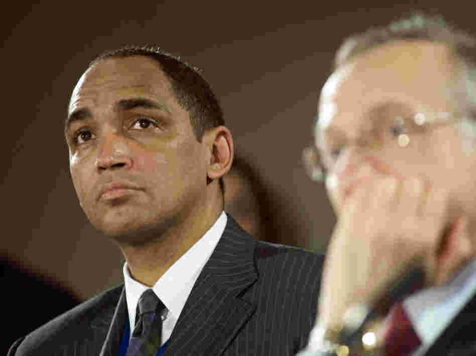 Wal-Mart's Dr. John Agwunobi (left) said in a statement that the company won't be "building a national, integrated, low-cost primary care health care platform." Even so, the leaves plenty of room  for the retailer to pursue an expansion of health care services at its stores.