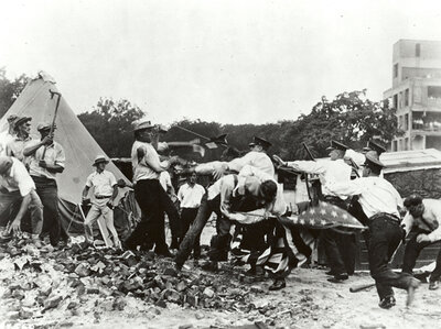 On July 28, officials sent in the Washington police to evict the marchers. The action was peaceful until someone threw a brick, the police reacted with force, and two bonus marchers were shot. The situation quickly spiraled out of control.  