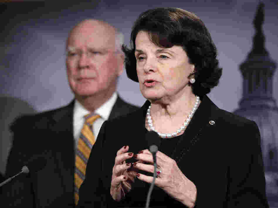 Sen. Dianne Feinstein, D-Calif., accompanied by Senate Judiciary Committee Chairman Patrick Leahy, D-Vt., gestures during a news conference on Capitol Hill on Thursday to discuss committee action on legislation to repeal the Defense of Marriage Act.