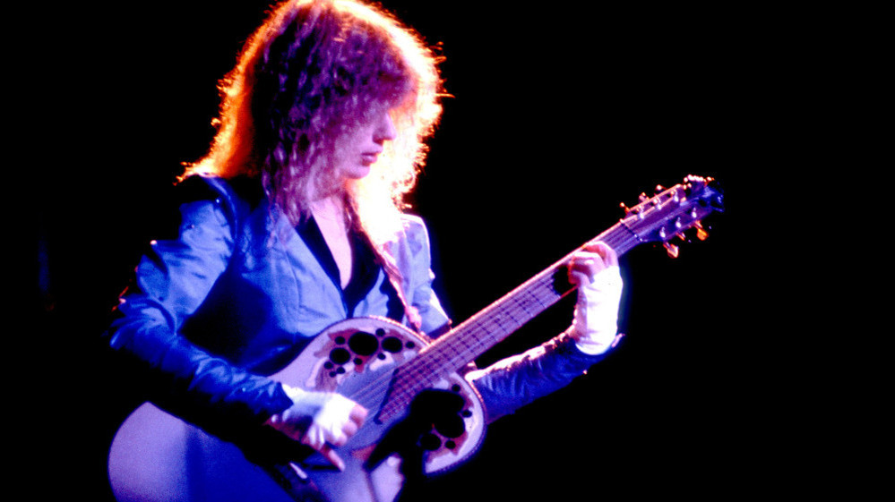 Heart's Nancy Wilson onstage in 1983, looking very Jimmy Page.