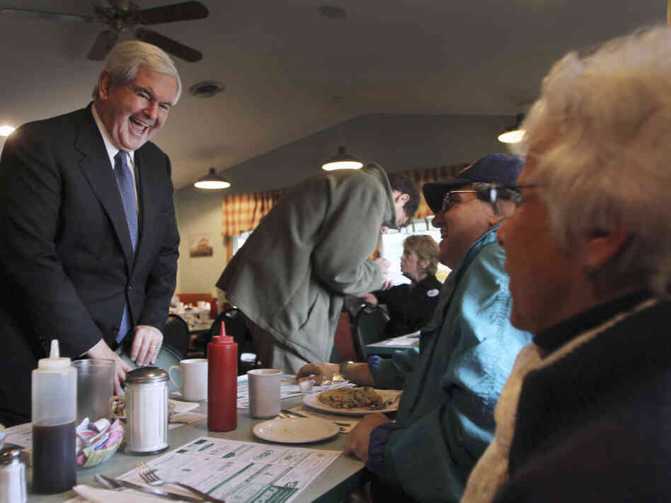 Gingrich talks to a breakfast crowd during a campaign stop at the Circle Restaurant in Epsom, N.H., on Friday. A new CBS poll of Republican primary voters finds him tied for second place with Mitt Romney, behind Herman Cain. 