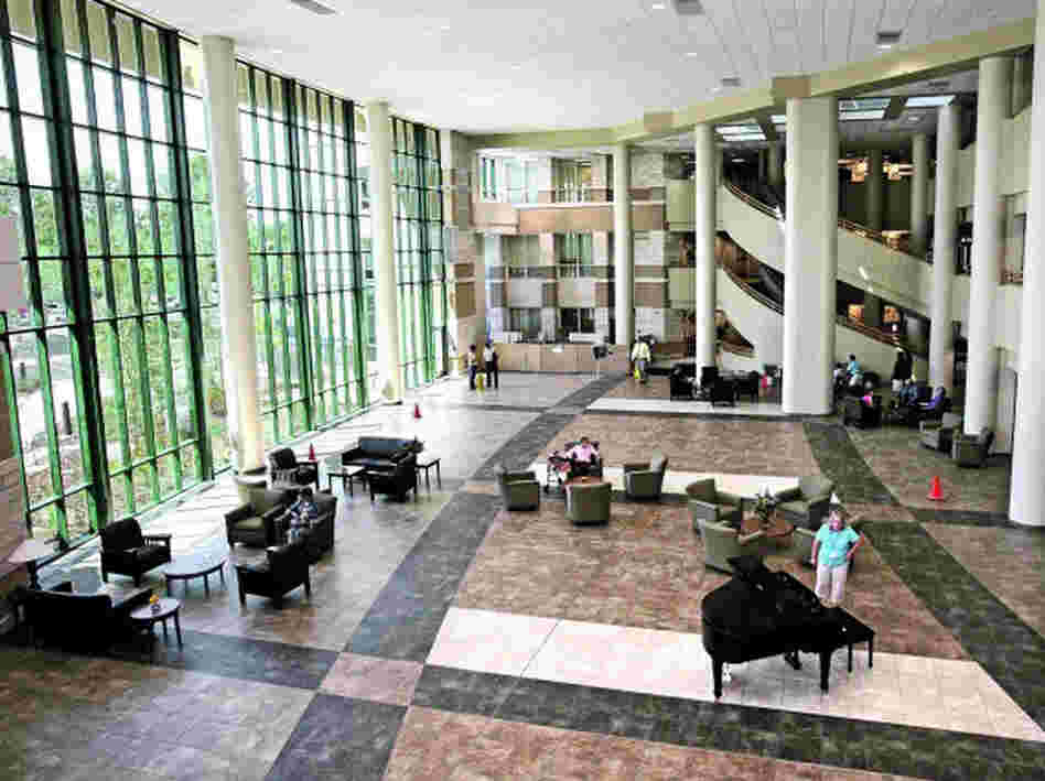 The lobby of the Billings Clinic has an abundance of natural light, and even a piano player, to create a calming, healing ambiance. The center is a top-class health-care facility for cancer treatment.