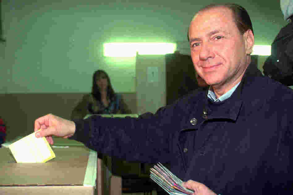 Silvio Berlusconi casts his ballots in the national referendum in Milan in 1995. The outcome of the referendum was decisive in determining the fate of Berlusconi's TV empire. 