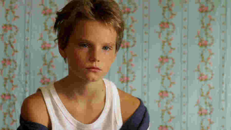 How The Other Half Lives: When 10-year-old Laure (Zoe Heran) moves to a town where no one knows her, she introduces herself as "Michael" — and spends the summer exploring what it's like to be a boy. How The Other Half Lives: When 10-year-old Laure (Zoe Heran) moves to a town where no one knows her, she introduces herself as "Michael" — and spends the summer exploring what it's like to be a boy.